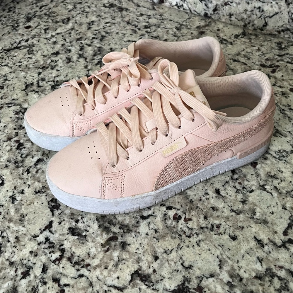 Puma tennis shoes.
